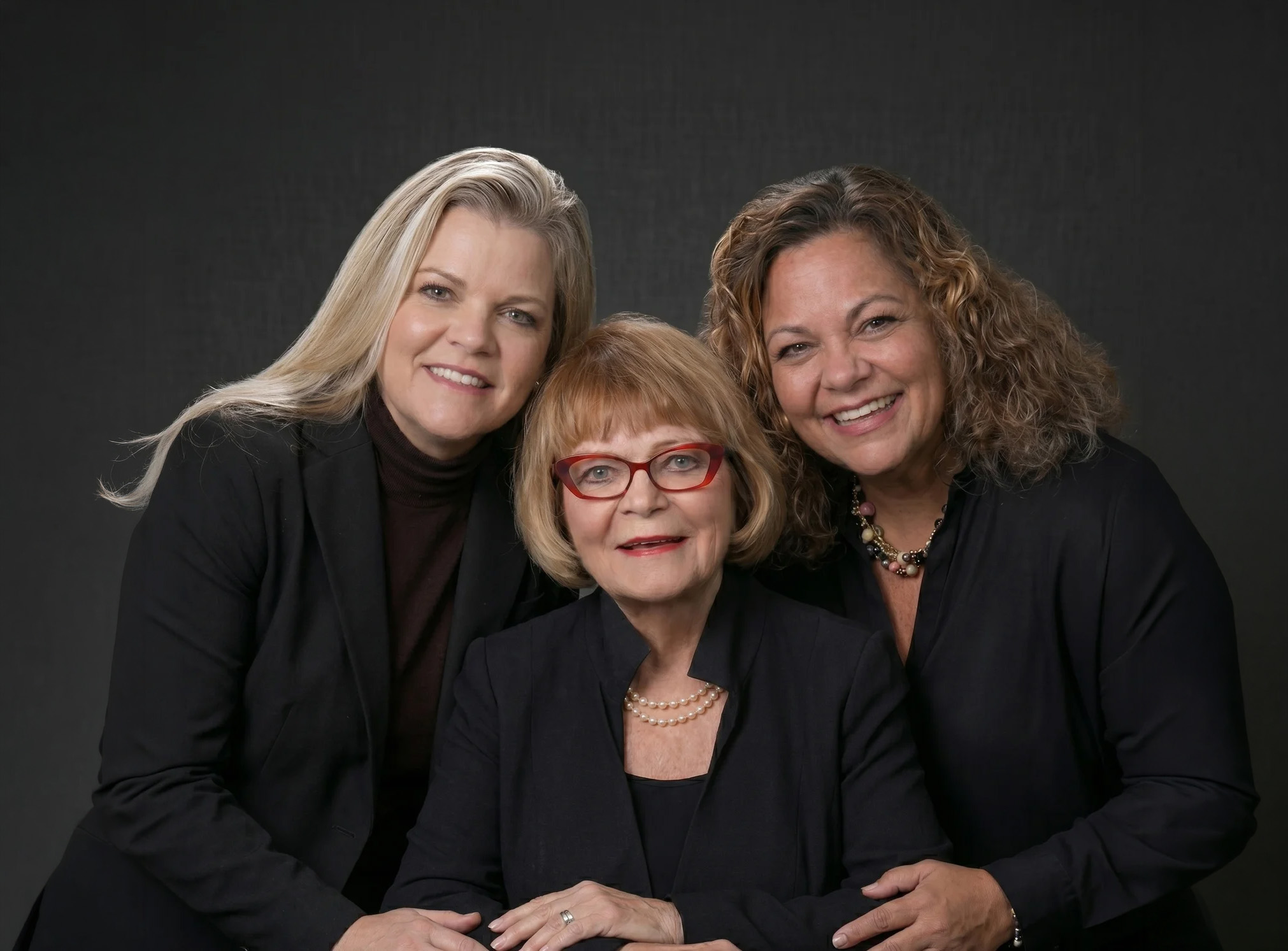 The McHenry & Associates Team — Mary Lou McHenry, Karen McHenry-Ruppe, and Mary Jo O'Neill